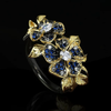 BLUE HUE ZIRCON FLOWER RING