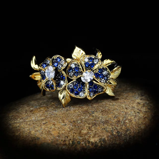 BLUE HUE ZIRCON FLOWER RING