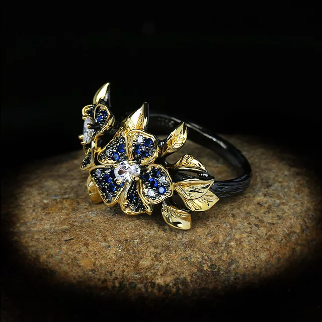 BLUE HUE ZIRCON FLOWER RING