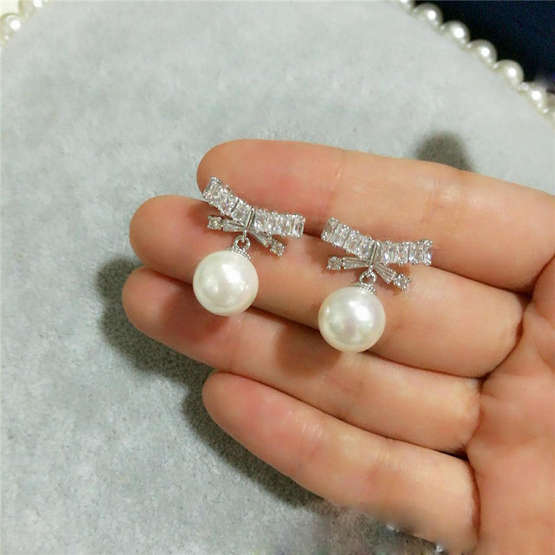 ELEGANT CRAVAT PEARL DROP EARRINGS