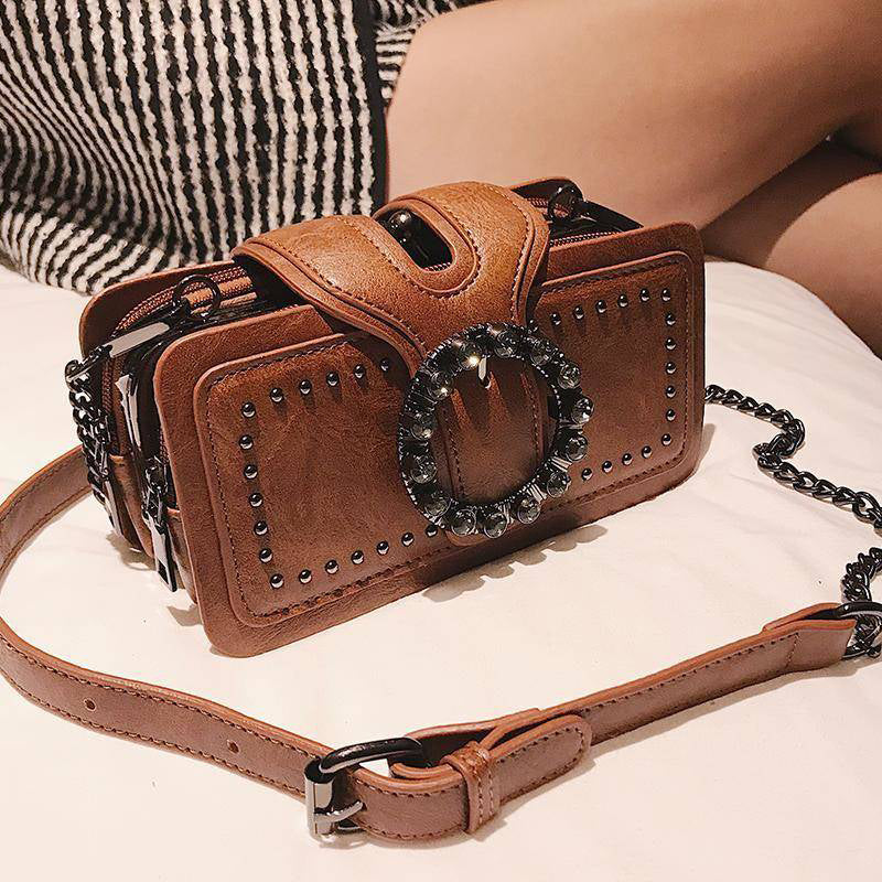 ROUND VINTAGE BUCKLE BAG