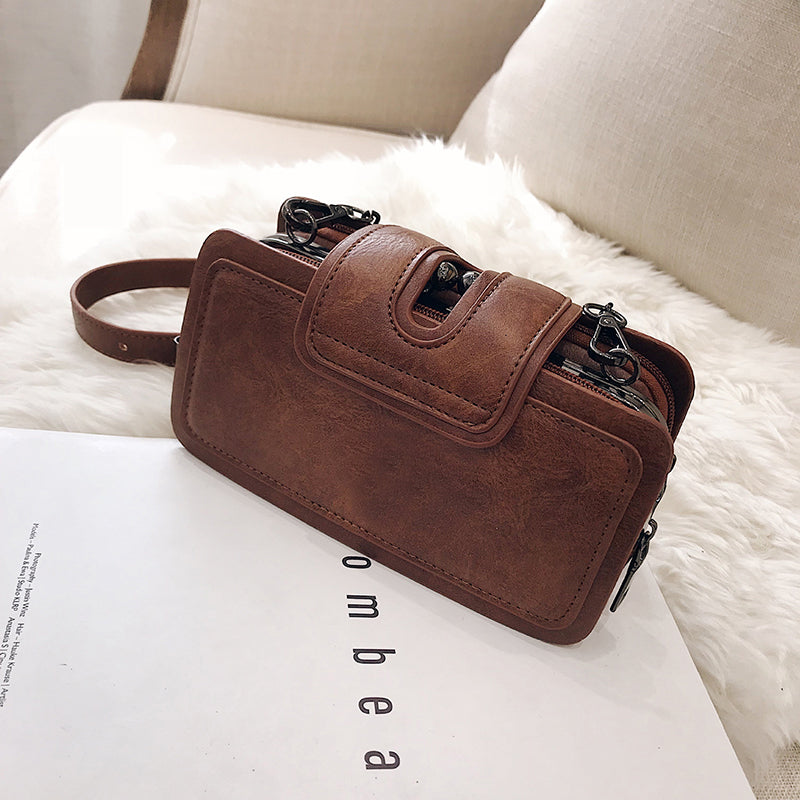 ROUND VINTAGE BUCKLE BAG