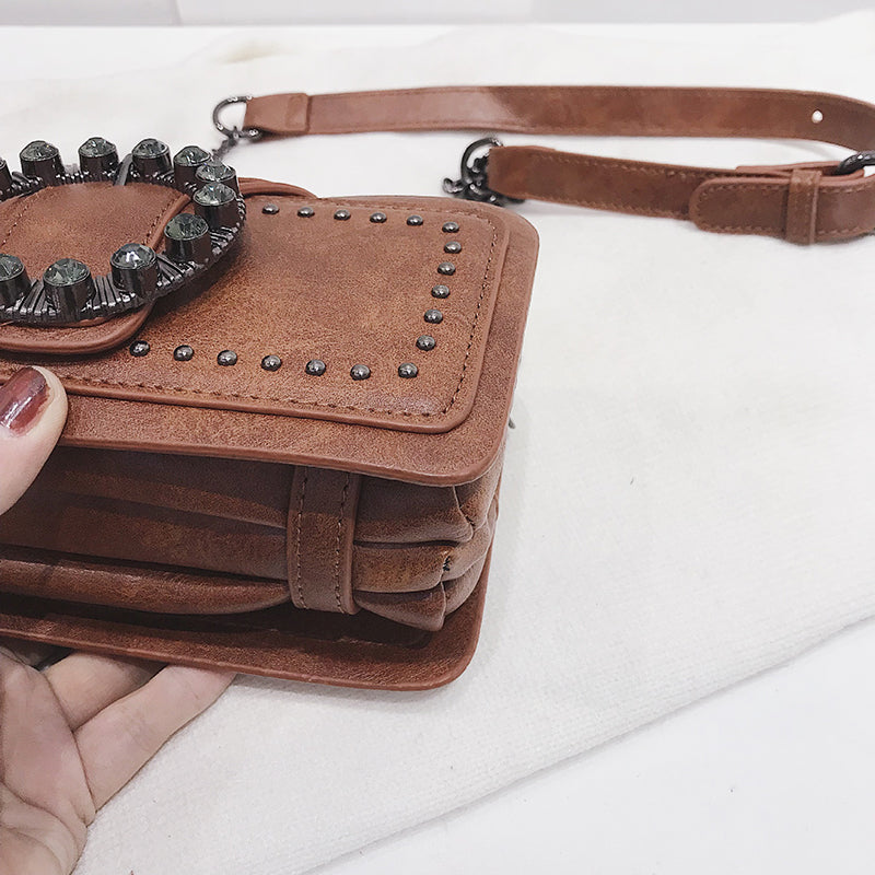 ROUND VINTAGE BUCKLE BAG