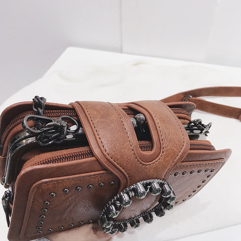 ROUND VINTAGE BUCKLE BAG
